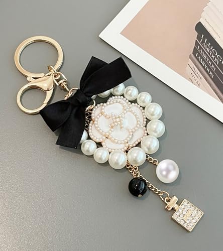 Camellia Flower Purse Charm Keychain with Bow and Pearl Accents - color: Whitee