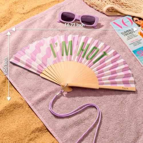 Fisura – Original Folding Fan with “I’m H*t” Message. Colorful Handheld Fan in Lilac with Wave Design and Strap Included. Fun Gift idea for Summer Travel Days or Outdoor Events. 16.7 x 9 in - color: I'm H*t, Purple Waves