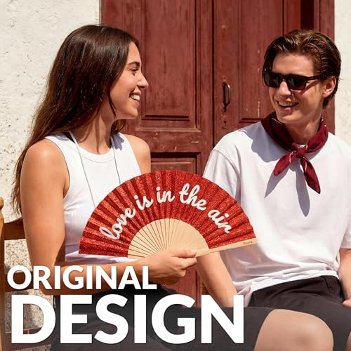Fisura – Original folding fan with “Love Is in the Air” message. Modern and colorful wooden folding fan. Red glitter folding fan. Includes strap. Fun gift idea. 16.7 x 9 in. - color: Love is in the Air, Red