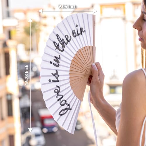 Fisura – Original white folding fan with message Love is in the air, wooden handheld fan for women, includes hanger, perfect for wedding, party, travel or romantic gift - color: Love is in the Air, Black and White