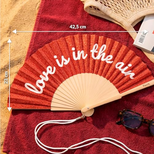 Fisura – Original folding fan with “Love Is in the Air” message. Modern and colorful wooden folding fan. Red glitter folding fan. Includes strap. Fun gift idea. 16.7 x 9 in. - color: Love is in the Air, Red